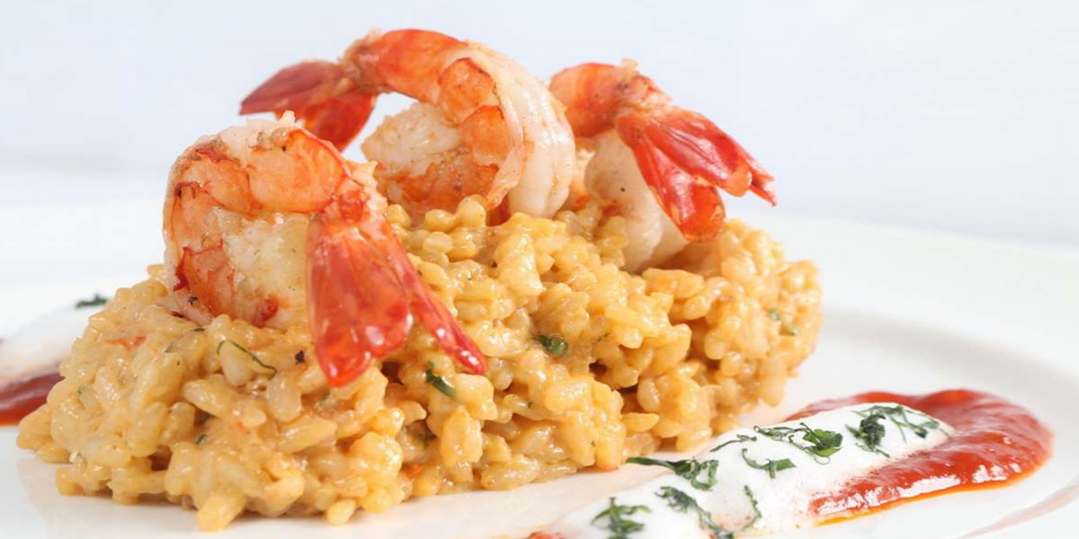 Risotto Carnaroli mantecato alla crema di scampi*