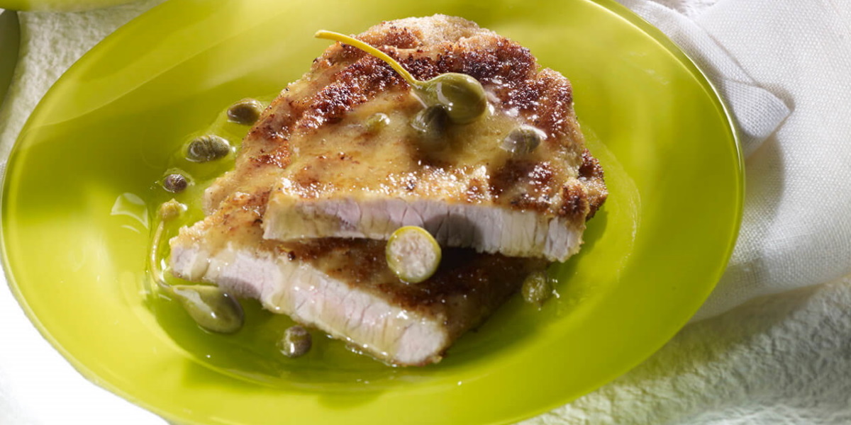 Scaloppa di vitello con demi glace all'arancia e verdurine 